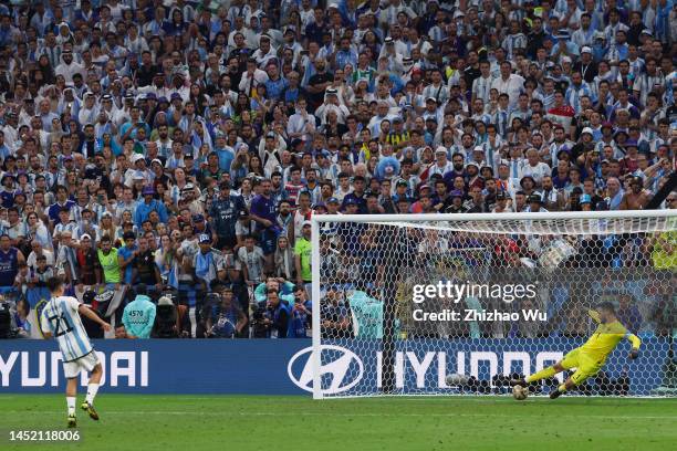 Paulo Dybala of Argentina shots during the penalty shot out of the FIFA World Cup Qatar 2022 Final match between Argentina and France at Lusail...