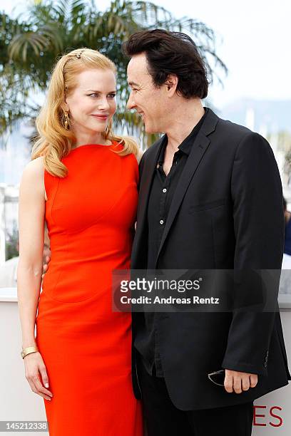 Actors Nicole Kidman and John Cusack attend the "The Paperboy" photocall during the 65th Annual Cannes Film Festival at Palais des Festivals on May...