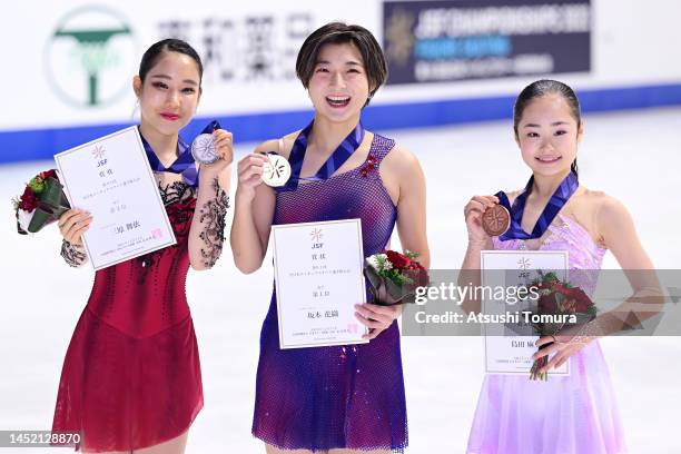 Mai Mihara , Kaori Sakamoto and Mao Shimada of Japan pose with their medals during day three of the 91st All Japan Figure Skating Championships at...