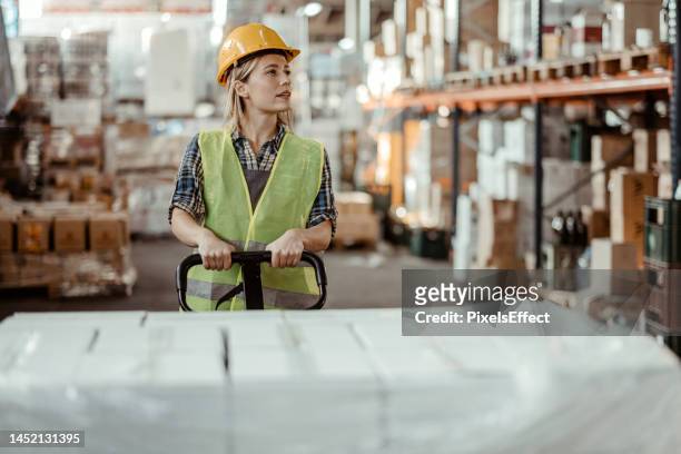 getting orders on the move - ware house worker forklift stock pictures, royalty-free photos & images