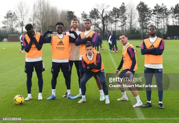 Sambi, Nukayo Saka, Matt Turner, Gabriel, Cedric and Nathan Butler-Oyedji of Arsenal during a training session at London Colney on December 24, 2022...