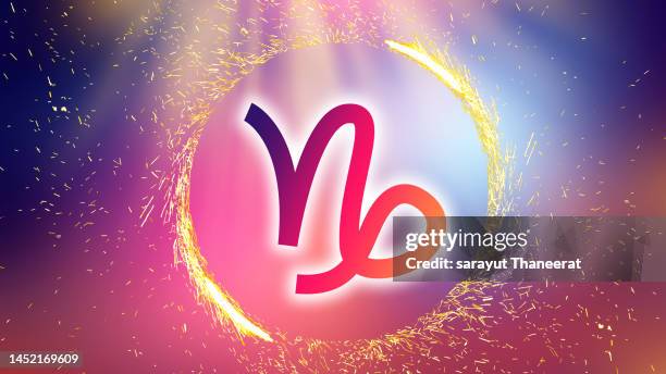 capricorn symbol on a colorful background light - virgo stock pictures, royalty-free photos & images