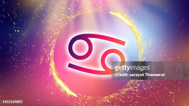 zodiac cancer symbol on a colorful background light - aries stock pictures, royalty-free photos & images