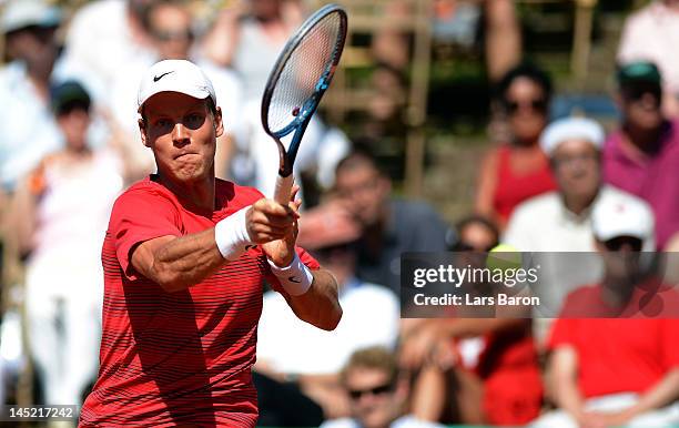 Tomas Berdych of Czech Republic plays a forehand during his match against Carlos Berlocq of Argentina during day five of Power Horse World Team Cup...