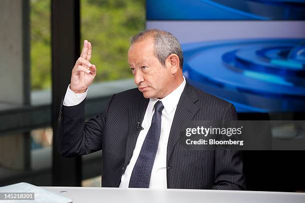 Egyptian billionaire Naguib Sawiris gestures during a Bloomberg Television interview in London, U.K., on Thursday, May 24, 2012. Sawiris said he'd be...