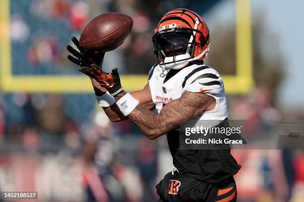 Ja'Marr Chase of the Cincinnati Bengals warms up against the New England Patriots at Gillette Stadium on December 24, 2022 in Foxborough,...