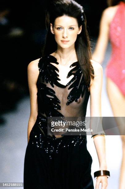 Model Caitriona Balfe, Collection was designed by Julien MacDonald.