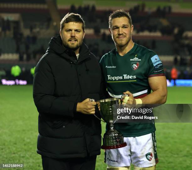 Former Leicester Tigers and Gloucester captain, Ed Slater presents the inaugural Slater Cup to winning team captain, Hanro Liebenberg of Leicester...