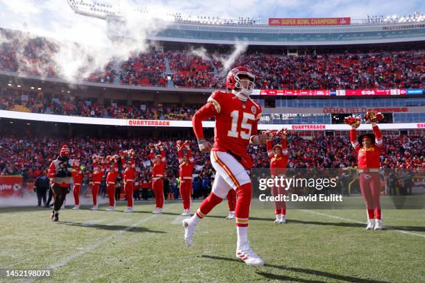 Patrick Mahomes of the Kansas City Chiefs runs onto the field during pregame against the Seattle Seahawks at Arrowhead Stadium on December 24, 2022...