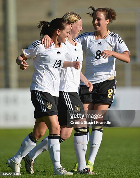 Irini Ioannidou of Germany celebrates scoring her goal with Stefanie Draws and Julia Arnold during the U23's womens international friendly mtach...