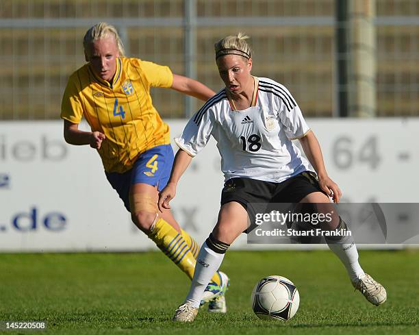 Svenja Huth of Germany is challenged by Anna Lindblom of Sweden during the U23's womens international friendly mtach between Germany and Sweden on...