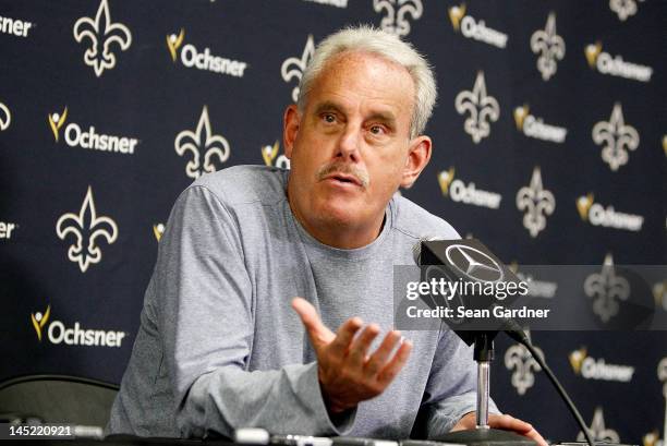 Interim head coach Joe Vitt of the New Orleans Saints answers question by the media after OTA's at the Saints Practice Facility on May 24, 2012 in...
