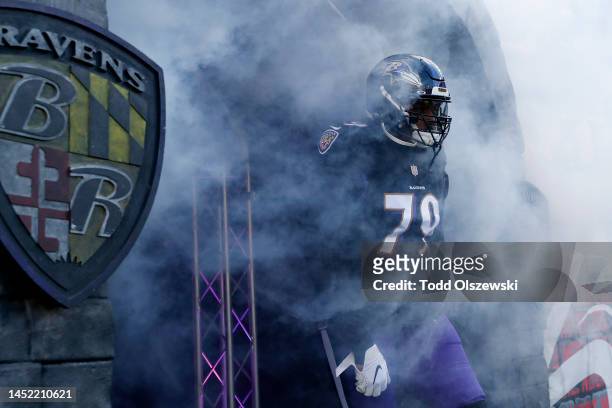 Ronnie Stanley of the Baltimore Ravens takes the field for the start of the game against the Atlanta Falcons at M&T Bank Stadium on December 24, 2022...