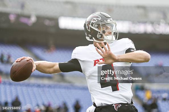 Desmond Ridder of the Atlanta Falcons passes as he warms up prior to ...