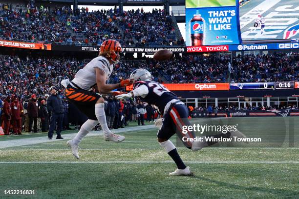 Trenton Irwin of the Cincinnati Bengals catches a touchdown over Shaun Wade of the New England Patriots during the second quarter at Gillette Stadium...