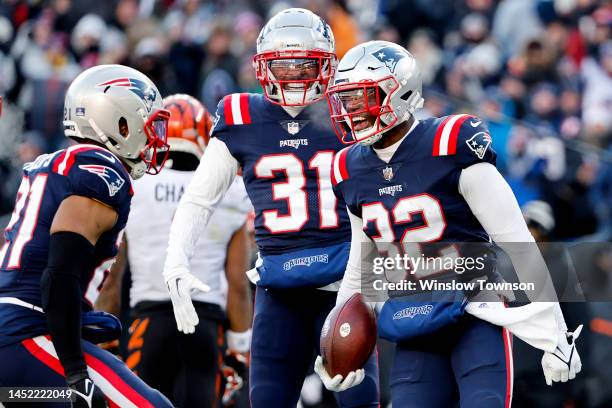 Devin McCourty of the New England Patriots celebrates after his interception during the second quarter against the Cincinnati Bengals at Gillette...