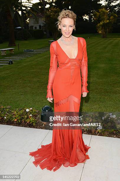 Singer Kylie Minogue attends the 2012 amfAR's Cinema Against AIDS during the 65th Annual Cannes Film Festival at Hotel Du Cap on May 24, 2012 in Cap...