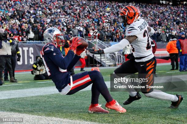 Kendrick Bourne of the New England Patriots catches a touchdown over Cam Taylor-Britt of the Cincinnati Bengals during the fourth quarter at Gillette...