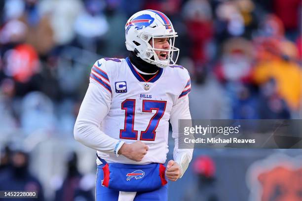 Josh Allen of the Buffalo Bills celebrates a first down during the fourth quarter in the game against the Chicago Bears at Soldier Field on December...