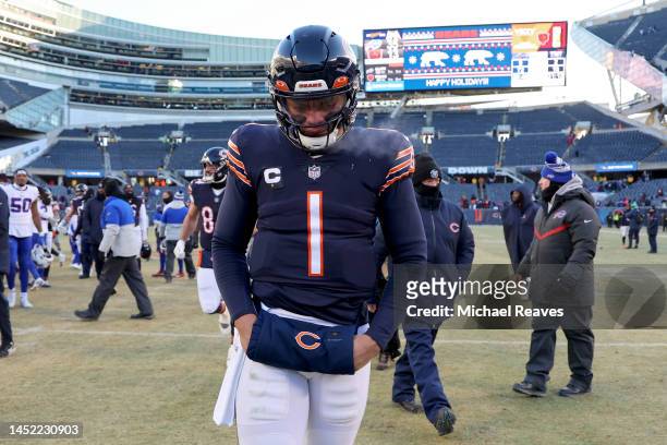Justin Fields of the Chicago Bears walks off the field after a loss to the Buffalo Bills at Soldier Field on December 24, 2022 in Chicago, Illinois.