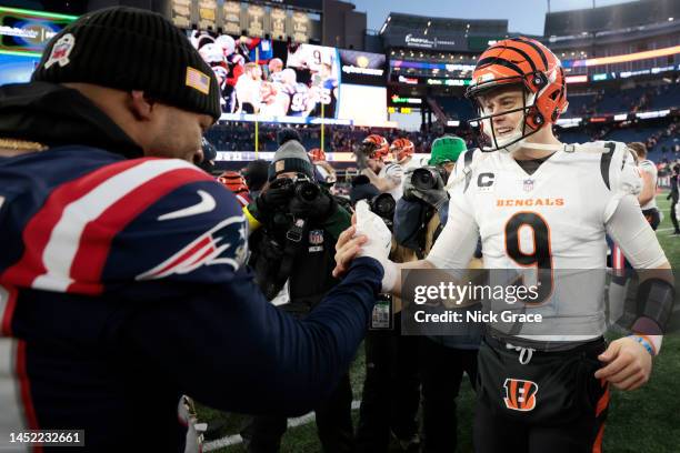 Raekwon McMillan of the New England Patriots and Joe Burrow of the Cincinnati Bengals shake hands after Cincinnati's 22-18 win at Gillette Stadium on...