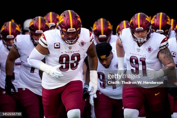 Jonathan Allen and John Ridgeway of the Washington Commanders take the field prior to a game against the San Francisco 49ers at Levi's Stadium on...