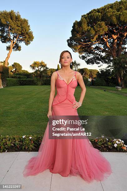 Actress Rose McGowan attends the 2012 amfAR's Cinema Against AIDS during the 65th Annual Cannes Film Festival at Hotel Du Cap on May 24, 2012 in Cap...