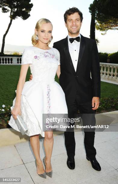 Actors Diane Kruger and Joshua Jackson attend the 2012 amfAR's Cinema Against AIDS during the 65th Annual Cannes Film Festival at Hotel Du Cap on May...