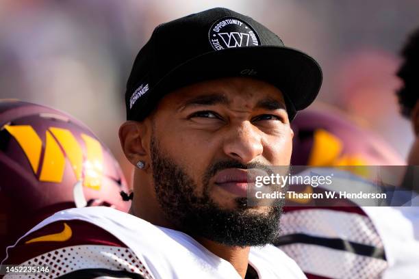 Montez Sweat of the Washington Commanders looks on from the bench during the second quarter of the game against the San Francisco 49ers at Levi's...