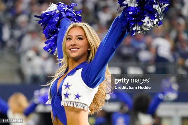 Dallas Cowboys cheerleader performs during the first half in the game against the Philadelphia Eagles at AT&T Stadium on December 24, 2022 in...