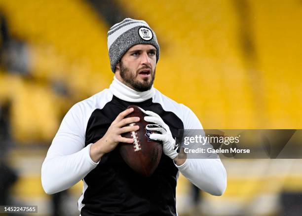 Derek Carr of the Las Vegas Raiders warms up prior to the start of the game against the Pittsburgh Steelers at Acrisure Stadium on December 24, 2022...