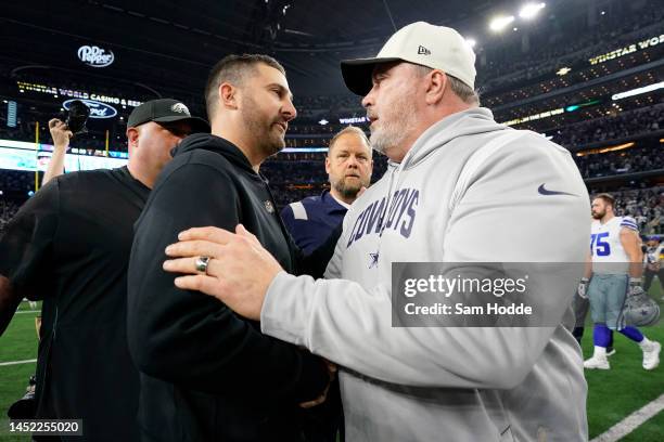 Head coach Nick Sirianni of the Philadelphia Eagles and head coach Mike McCarthy of the Dallas Cowboys embrace after the game at AT&T Stadium on...