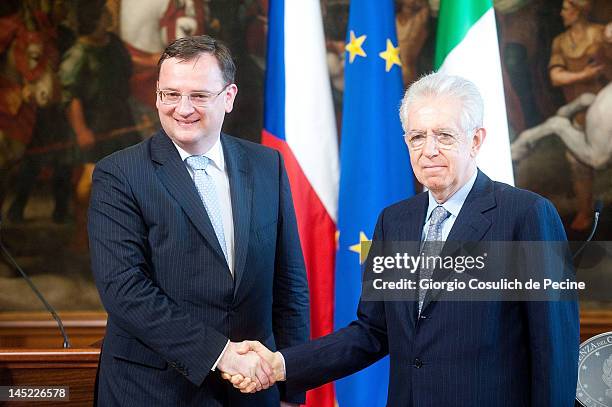 Italian Prime Minister Mario Monti shakes hands with Czech Republic Prime Minister Petr Necas at Palazzo Chigi on May 24, 2012 in Rome, Italy. During...