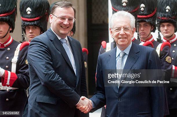 Italian Prime Minister Mario Monti shakes hands with Czech Republic Prime Minister Petr Necas at Palazzo Chigi on May 24, 2012 in Rome, Italy. During...