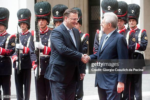 Italian Prime Minister Mario Monti shakes hands with Czech Republic Prime Minister Petr Necas at Palazzo Chigi on May 24, 2012 in Rome, Italy. During...