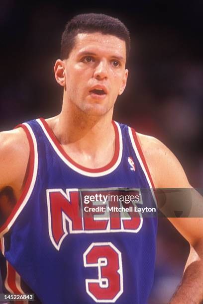 Drazen Petrovic of the New Jersey Nets looks on during a basketball game against the Washington Bullets at the Capitol Centre on March 25 1991 in...