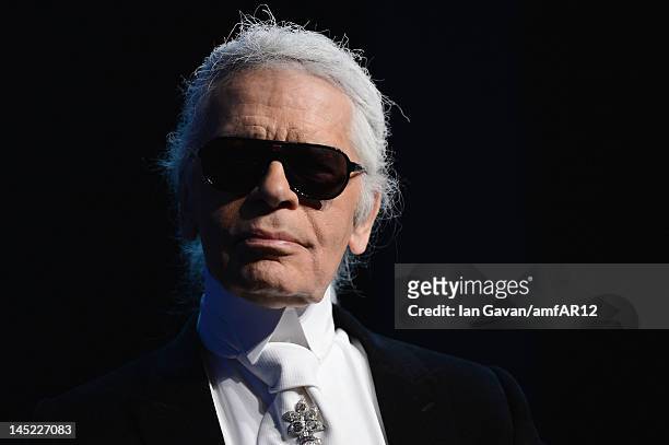 Designer Karl Lagerfeld attends the 2012 amfAR's Cinema Against AIDS during the 65th Annual Cannes Film Festival at Hotel Du Cap on May 24, 2012 in...
