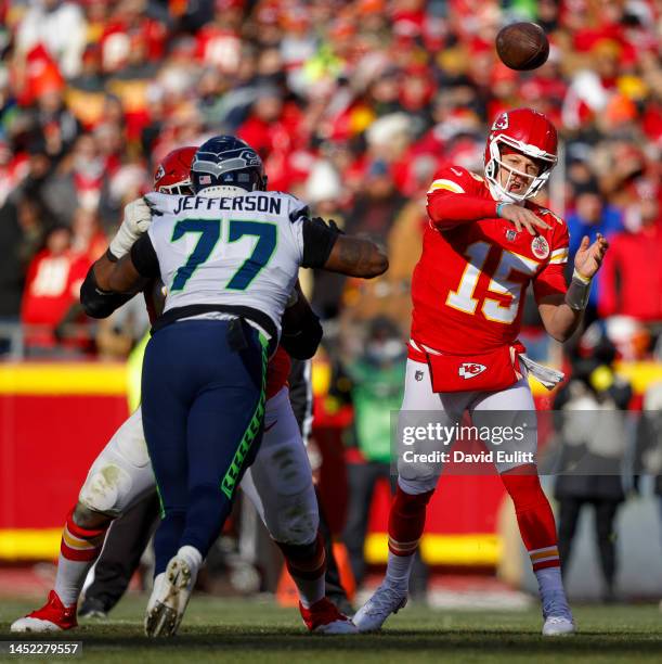 Patrick Mahomes of the Kansas City Chiefs throws a second quarter pass against the Seattle Seahawks at Arrowhead Stadium on December 24, 2022 in...