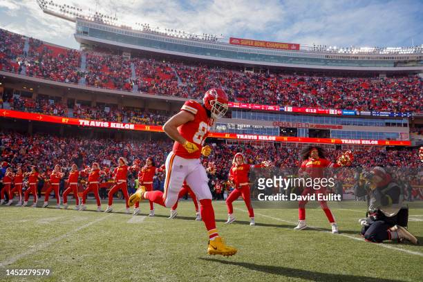 Travis Kelce of the Kansas City Chiefs runs onto the field during player introductions prio to the game against the Seattle Seahawks at Arrowhead...
