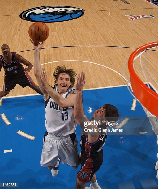 Steve Nash of the Dallas Mavericks shoots against John Stockton of the Utah Jazz at the American Airlines Center in Dallas, Texas. DIGITAL IMAGE NOTE...