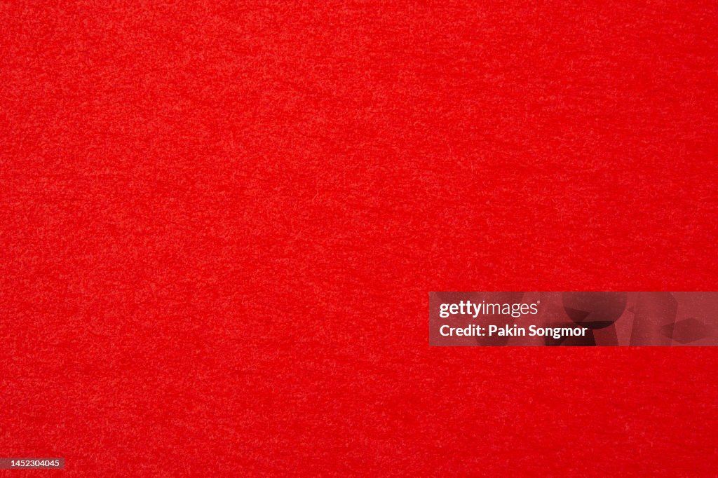 Red paper sheet texture cardboard background.
