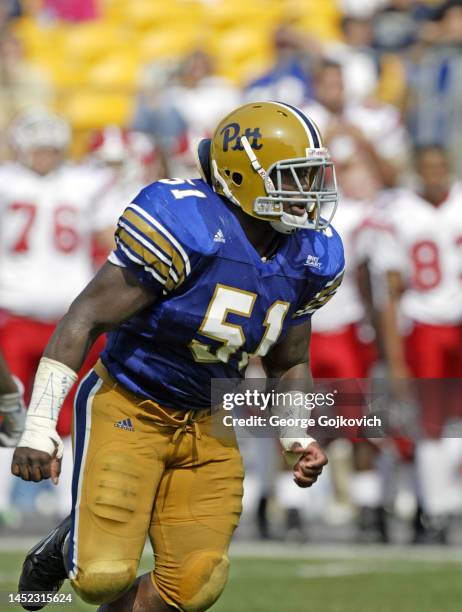 Linebacker H.B. Blades of the University of Pittsburgh Panthers pursues the play against the Youngstown State Penguins during a college football game...