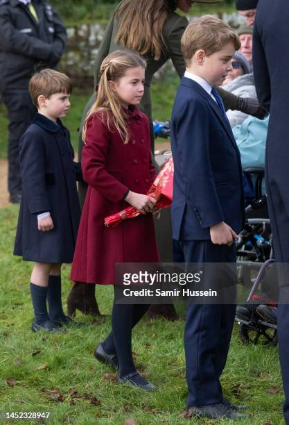 Prince George, Princess Charlotte and Prince Louis attend the Christmas Day service at Sandringham Church on December 25, 2022 in Sandringham,...