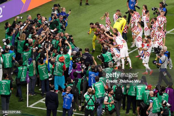 Players of Croatia present the bronze medal and take group photo during the award ceremony of the FIFA World Cup Qatar 2022 3rd Place match between...