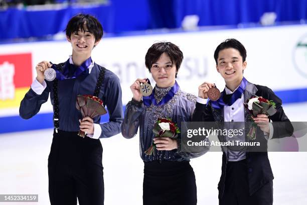 Koshiro Shimada of Japan , Shoma Uno of Japan and Kazuki Tomono of Japan during day four of the 91st All Japan Figure Skating Championships at Towa...