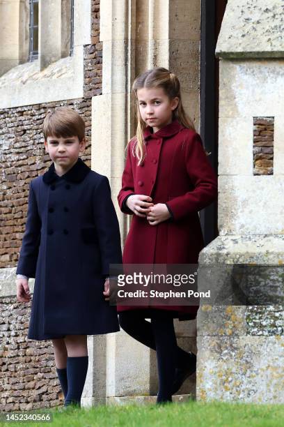 Camilla, Queen Consort, Princess Charlotte of Wales and Prince Louis of Wales after the Christmas Day service at Sandringham Church on December 25,...