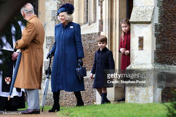 Camilla, Queen Consort, Princess Charlotte of Wales and Prince Louis of Wales after the Christmas Day service at Sandringham Church on December 25,...