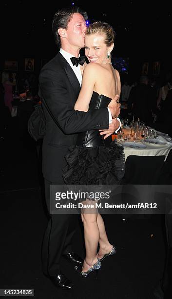 Gregorio Marsiaj and Eva Herzigova arrive at the 2012 amfAR's Cinema Against AIDS after party during the 65th Annual Cannes Film Festival at Hotel Du...