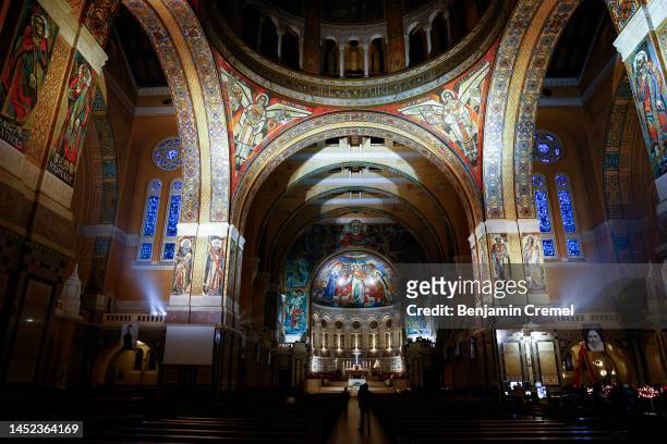 People visit the Basilica of Saint Therese of Lisieux on Christmas Day on December 25, 2022 in Lisieux, France. The Basilica of Sainte-Thérèse of...
