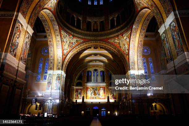 People visit the Basilica of Saint Therese of Lisieux on Christmas Day on December 25, 2022 in Lisieux, France. The Basilica of Sainte-Thérèse of...